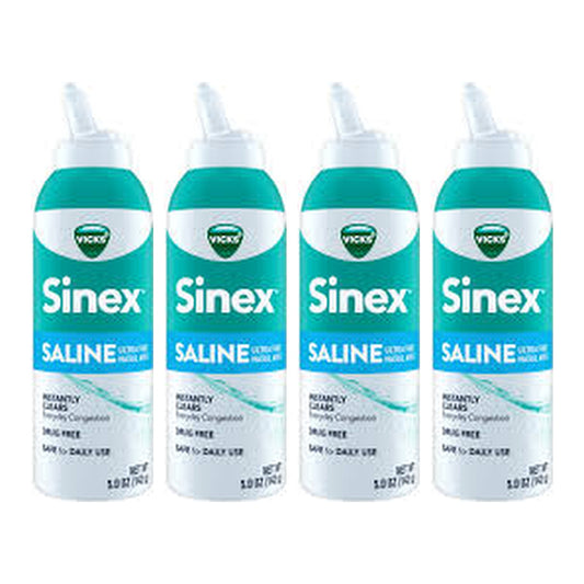 Four bottles of Vicks Sinex Saline Nasal Spray on a white background